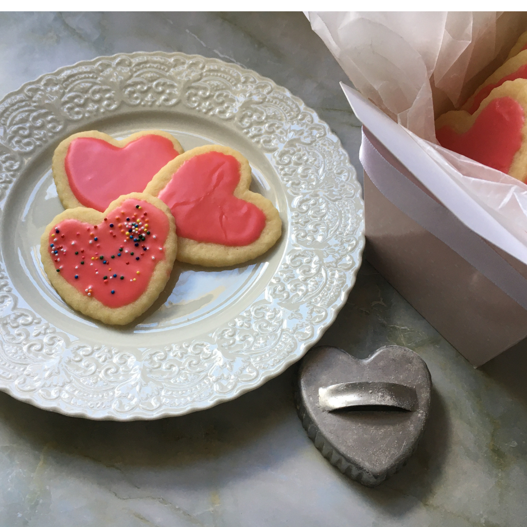 Decorated Heart Sugar Cookies on Plate and in Container
