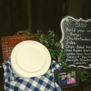 Picnic basket with checked cloth and plates