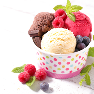 Cup of ice cream scoops and fruit