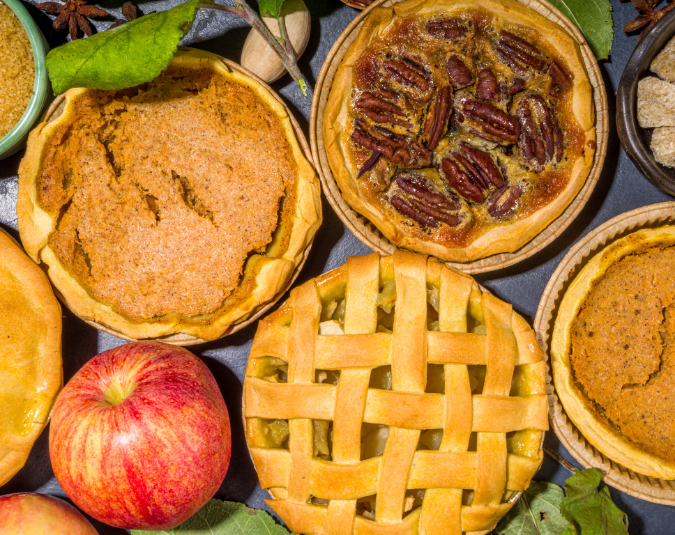 Assortment of pies displayed on table